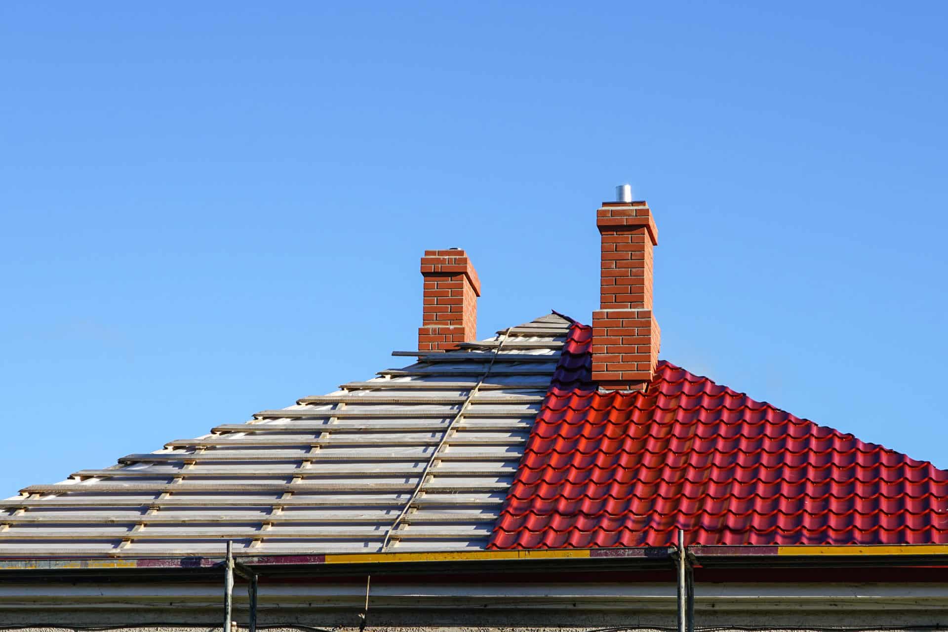 half of a roof being replaced