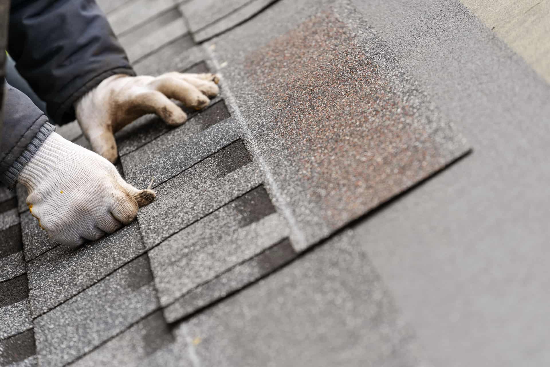 3 tab shingles being installed by a roofing company