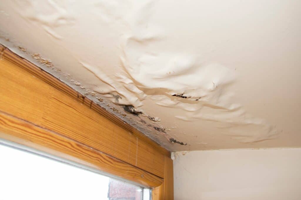 damage to ceiling caused by roof leak that wasn't fixed